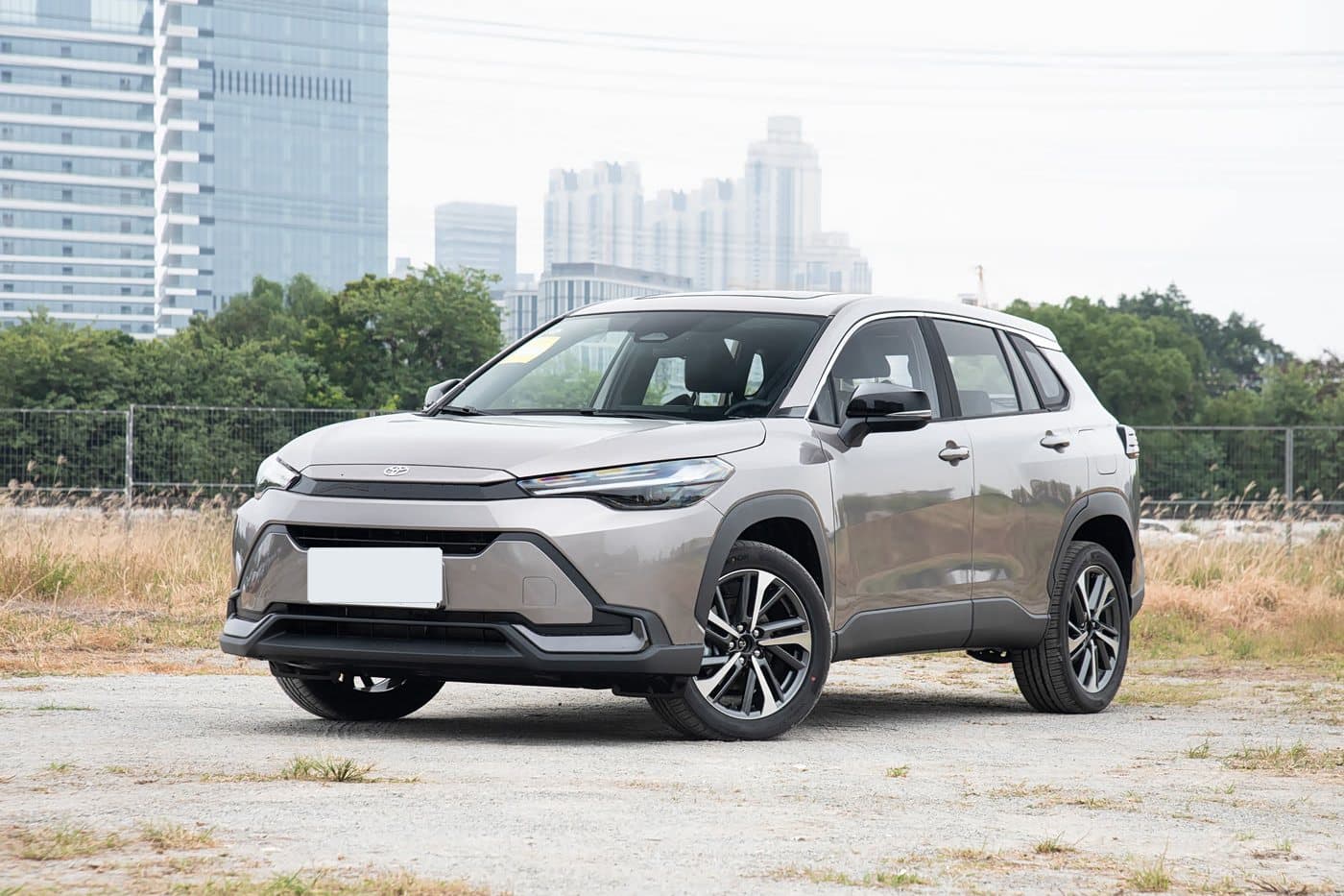 2026 Toyota Frontlander — front three-quarter view, Desert Gold, compact SUV for export